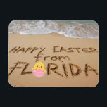 Happy Easter from Florida Written in the Sand Magneet<br><div class="desc">Happy Easter Florida Style! The design on this tropical-themed flexible magnet features a joyful "Happy Easter from Florida" message written in the sand on a sunny beach with the calm turquoise ocean in the background. A small baby chick in an Easter egg completes the design. The magnet is a great...</div>