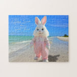 Happy Easter from Sanibel Island Florida Beach Legpuzzel<br><div class="desc">Happy Easter Florida Style! The design on this tropical-themed holiday jigsaw puzzle features an original photograph of a Sanibel Island Florida beach with its calm turquoise ocean, azure blue sky, and shell-laden sandy beach. (Photographed by Glenda Motsavage in painting mode.) A life-size Easter bunny decked out in pretty pastel pink...</div>