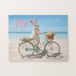 Happy Easter Hilton Head Island Bicycle on Beach Legpuzzel<br><div class="desc">Happy Easter Hilton Head Style! The design on this cheerful holiday jigsaw puzzle features a whimsical Easter bunny wearing a festive spring-themed headdress and a basket overflowing with colorful painted eggs riding a vintage bicycle on a sun-drenched beach. The pink text reads "Happy Easter." The jigsaw puzzle is the perfect...</div>