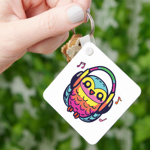 Happy Owl met hoofdtelefoons die naar muziek luist Sleutelhanger