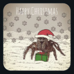 Happy Spider Christmas Vierkante Sticker<br><div class="desc">Maak Kerstmis raar met deze grappige Happy Spider-Kerst stickers met een lachende spin (met een kerstmuts) en cadeau. Deze unieke stickers zijn ideaal voor envelopzegels en pakketdecoratie. Zie meer grappige,  vreemde en eigenzinnige kerstartikelen in deze en andere design in onze winkel.</div>