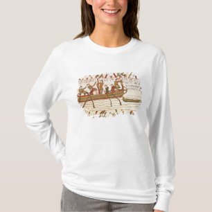 Harold kruist het Kanaal naar het grondgebied van T-shirt