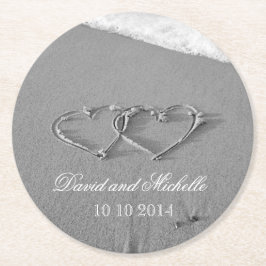 Hart in de onderzetters van de zandtrouwpartij