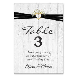 Hart met zwart lint op gewitwasd hout kaart