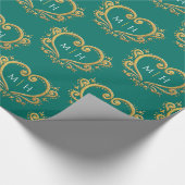 Hart-monogram van goud op donkergroene trouw cadeaupapier (Hoek)