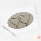 Harten getekend in zand ovale sticker (Envelop)