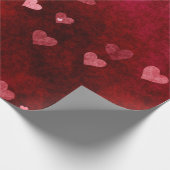 Harten op rode achtergrond cadeaupapier (Hoek)