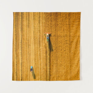 Harvester-machine die in het veld werkt. Combineha Wandkleed