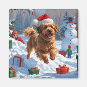 Havanese rent in de sneeuw met kerstmuts magneet (Voorkant)