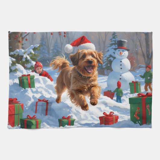 Havanese rent in de sneeuw met kerstmuts theedoek (Horizontaal)