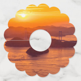 Hazy sunset on Kurushima Kaikyo Bridge and Kurushi Wijnglaslabel