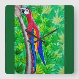 Hé, er zit een scharlaken ara in die boom! vierkante klok