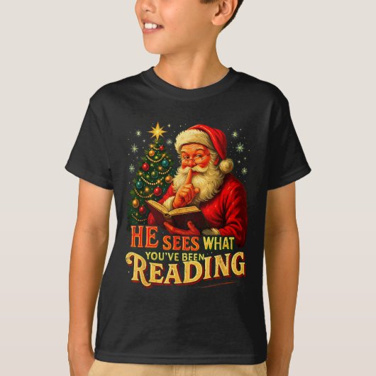 He Sees What You’ve Been Reading Santa Book Lover  T-shirt (Voorkant)