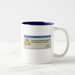 Heb je geprobeerd het uit en weer aan te zetten, m tweekleurige koffiemok