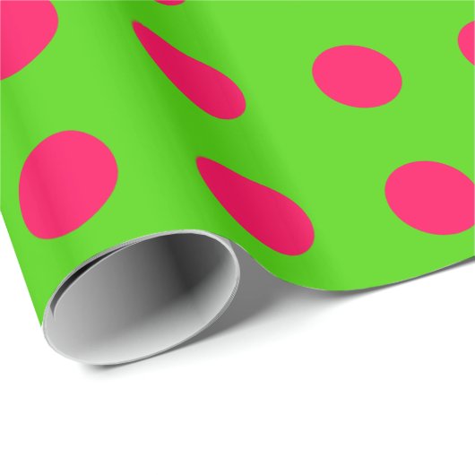 Heb vette kerstroze pooldots op groen cadeaupapier (Rol Hoek)
