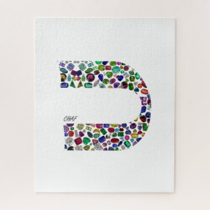 Hebreeuwse letter 'CHAF' gemaakt met edelstenen in Legpuzzel