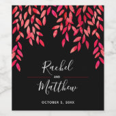 Heet roze bladeren en wijnstokken op zwart wijn etiket (Enkel label)