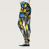 Helder abstract bloemmotief op zwarte achtergrond leggings (Links)