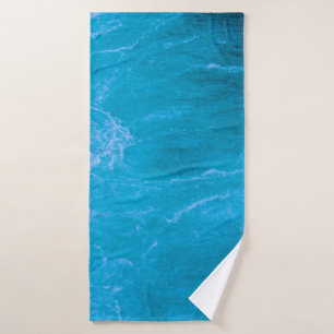 Helder blauw water badhanddoek