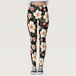 Helder bloempatroon op zwart leggings