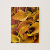 Helder gekleurde calla's bij de legpuzzel (Verticaal)