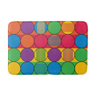 Helder gekleurde cirkels en strips badmat