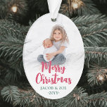 Helder Modern Script Merry Christmas 2 foto's Ovaa Ornament<br><div class="desc">Vier de eenvoudige geneugten van de feestdagen met een kleurrijke moderne twee foto acryl ovaal ornament. De afbeeldingen en alle tekst op deze sjabloon zijn gemakkelijk te personaliseren en kunnen verschillend of hetzelfde zijn op de voor- en achterkant. Prettige feestdagen kind Het kan elke formulering bevatten, zoals Vrolijk kerstfeest, Het...</div>