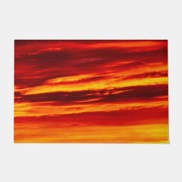 Helder rood zonsonderstel deurmat