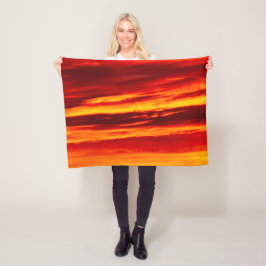 Helder rood zonsonderstel fleece deken
