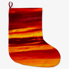 Helder rood zonsonderstel grote kerstsok