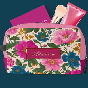 Helder roze en blauwe bloemen op crème toilettasje