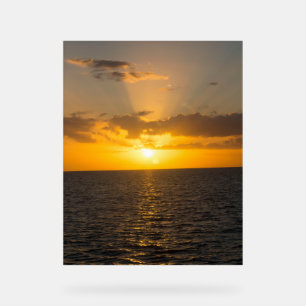 Helder zonsondergang boven de oceaan acryl bord