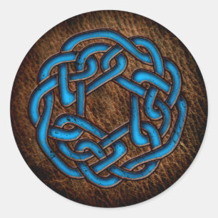 Helderblauw ornament op leder ronde sticker