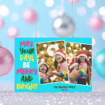 Helderblauw Vrolijk Kerstfeest Twee Fotocollage Feestdagenkaart<br><div class="desc">Schattigee en vrolijke familie foto collage vakantie kaarten met een kleurrijke streng van kerstverlichting gewikkeld rond uw 2 favoriete kinder foto's. Moge uw dagen vrolijk en helder zijn,  geschreven in vette letters. Een regenboog van kleuren voor de feestdagen. Voeg uw favoriete twee verticale afbeeldingen toe.</div>