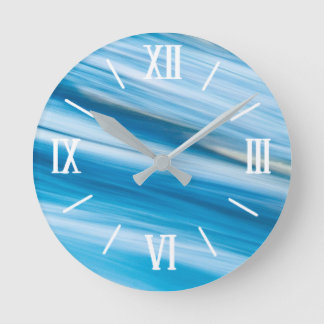 Heldere blauw-waterwandklok ronde klok