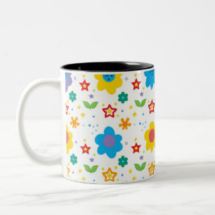 Heldere bloemen en sterren tweekleurige koffiemok