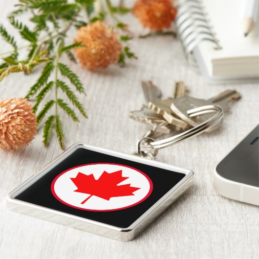 Heldere Canadese zwarte lebbenrode cirkel wit zwar Sleutelhanger (Zijkant)