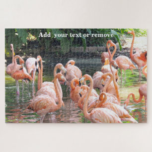 Heldere kleurrijke groep roze flamingos in water, legpuzzel