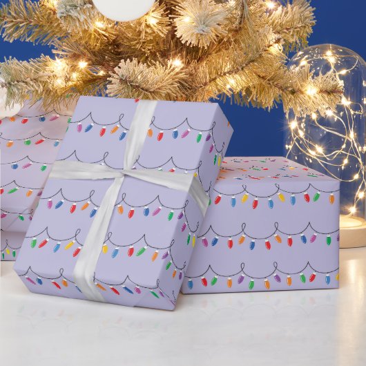 Heldere kleurrijke kerstverlichting gloeit naadloo cadeaupapier (Feestdagen)