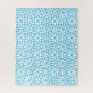 Heldere lichtblauwe witte geometrische symmetriepa legpuzzel