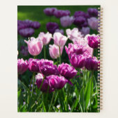 Heldere lila en roze tulpen op een zonnige dag planner (Achterkant)