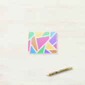 Heldere regenboogkleuren mozaïek post-it® notes (Op bureau)