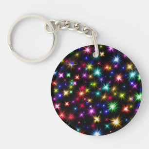 Heldere regenboogsparken, sterren en vuurwerk sleutelhanger