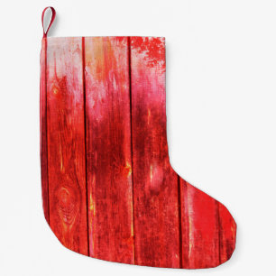 Heldere, rode houten wandstructuur. Houttextuur w Kleine Kerstsok