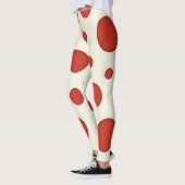 Heldere rode stippen met een  twist op wit leggings (Links)