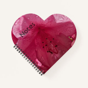 Heldere roze bloem met tekst notitieboek