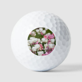 Heldere witte en roze tulpen op een zonnige dag golfballen