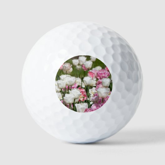 Heldere witte en roze tulpen op een zonnige dag golfballen (Voorkant)