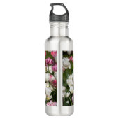 Heldere witte en roze tulpen op een zonnige waterfles  (Achterkant)