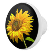 Heldere zonnebloem op zwarte achtergrond keramische knop (Rechts)